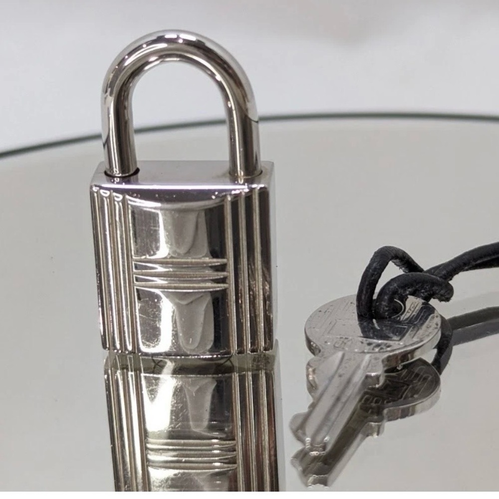Hermes silver lock and key 100%Authentic